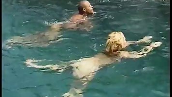 Two hot babes share BBC near the waterfall