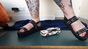 Giantess Jayne crushes an Audi Rally car in chunky sandals toy car crush closeup view view