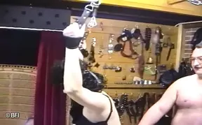 Mature sub gets whipped and fisted in a bdsm session