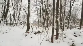 Diaper girl wetting and messing on a wintry shore in public