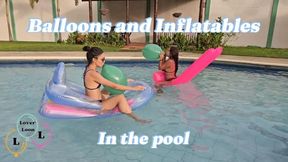 Marianna and Carmen have fun with their balloons and inflatables in the pool