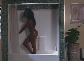 Round ass ebony beauty getting strapon fucked by classy lesbian