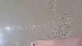 My small feet walking on the beach