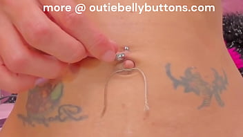 Outie belly button play lightly tied with string