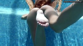 Tiffany blonde perfect round booty teen swims underwater and undresses
