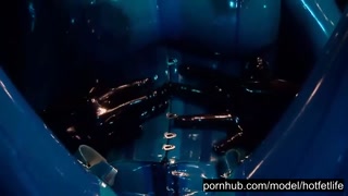 Heavy rubber goddess with big tits in transparent blue latex catsuit and mask masturbates - part 2