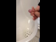 boy jerking and cumming in urinal