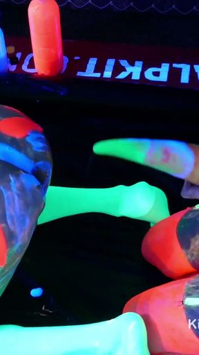 Wet and Messy glowing UV slime colourful alien goo play   Clip 3