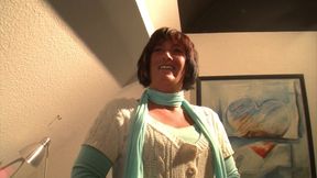 Sexy MILF moans as she fucks her shaved pussy with a dildo