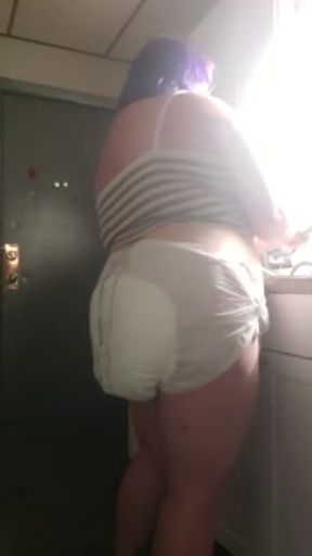 Dancing in Diapers doing dishes