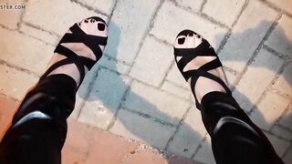 Watch this hot tranny babe in high heels and lingerie get her pussy pounded in public!