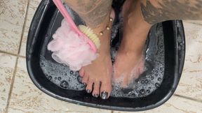 Washing the beautiful curvy feet
