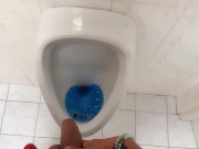 Peeing and moaning after pee desperation at the public urinal