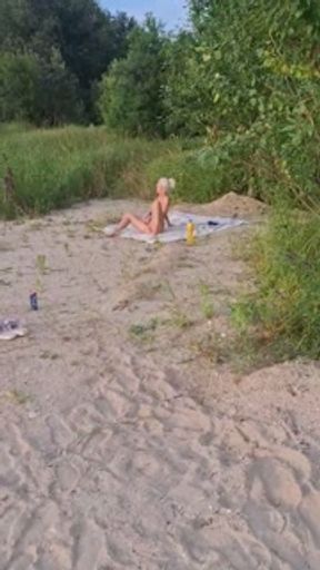 KateSmith caught masturbating on an empty beach.
