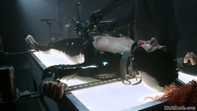 ”Shackled ebony in latex beaver vibed”