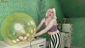 Alla destroys two balloons with a pump