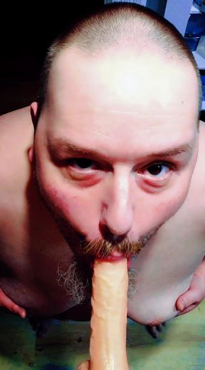 Chubby sucking dildo