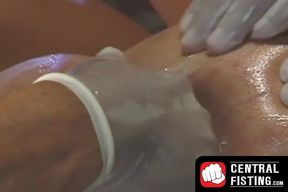 Lubed-up homo's ass gaped and fisted in a wild threesome