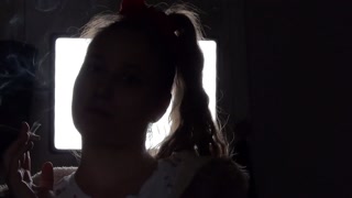 Shadow play while I light a cigarette. Alternative video, by long blonde hair girl