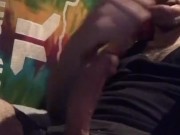 Stroking curved hard throbbing cock