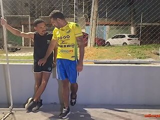After the pickup game, the player and the coach are caught having sex behind the court.