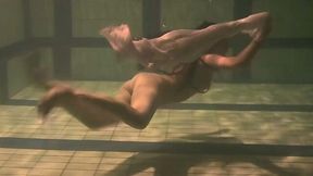 Naughty Russian amateur brunette in white clothes underwater