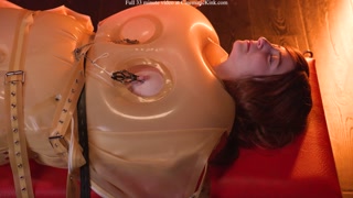 Wendy Wonder in inflatable latex sack