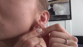 EAR PULLING AND PIERCE THE EAR LOBES WITH NEEDLE and THREAD