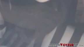 Cameraman catches how this Asian lady satisfies her cunts needs