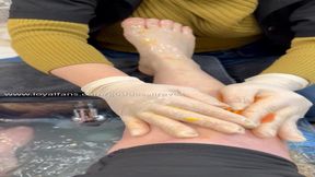 Orange slice pedicure on legs and feet