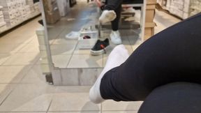 Dirty socks and sneakers at the store 4K