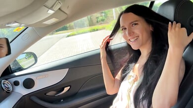 Long-haired beauty teases in sheer dress as vibrator play builds to changing room tension