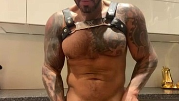 Latino gay pornstar in harness and leather panties in the kitchen fingering my cock - VIKTOR ROM -