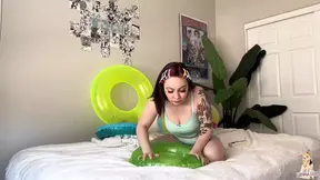 Tattooed girl deflates her favorite inflatable toys