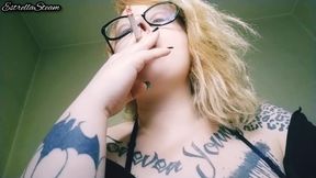 Blonde smokes a cigarette  NO AUDIO