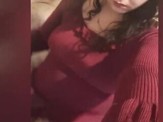 Stud with titties wearing red dreas and hose