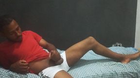 Hot brunette in bed in his bedroom masturbating