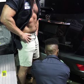 Muscular mechanic fucks his black employee in the shop