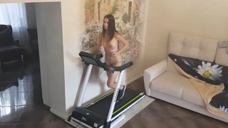 Naked girl on a treadmill
