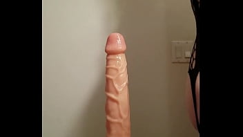 Sissy crossdresser playing with 10 inch dildo