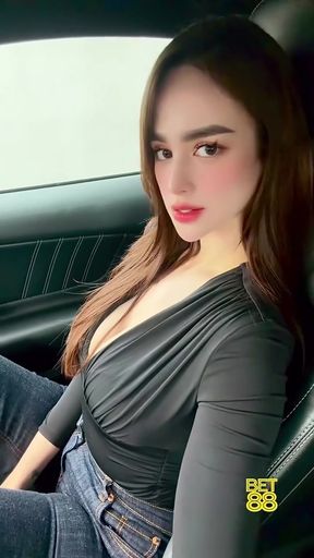 Slim Filipina celebrity shows off her curves while sitting alone