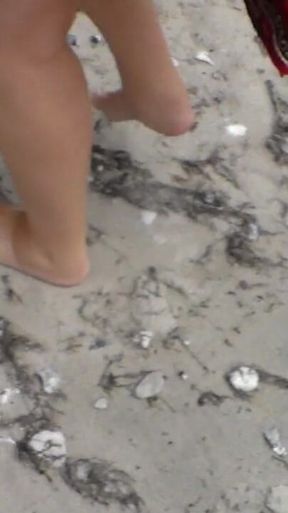 Jen Shows up Her Naked Feet in the Sand