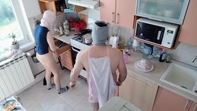Amateur couple having fun in the kitchen