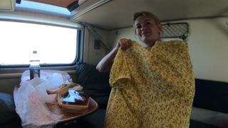 Naked girl in a reserved seat train carriage