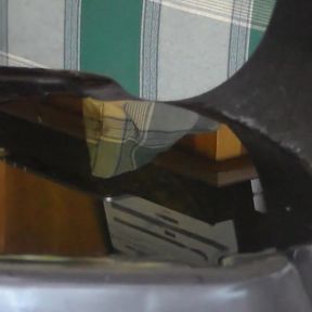 John is peeing all on the plastic chair