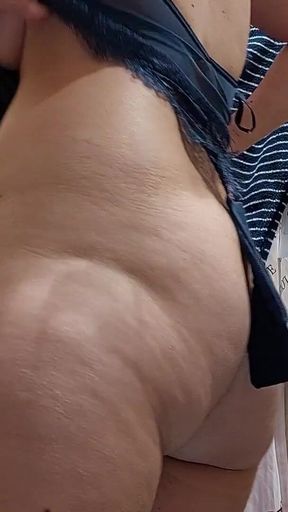 Key moment from &quot;Naughty sexy milf tries on naked clothes. Latina hairy pussy tries on clothes in bed.&quot;