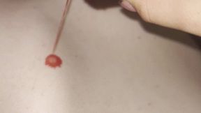 Girl performs wax play on a tied up male slave