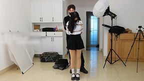 Stocky girlfriend bound by rope restraints.