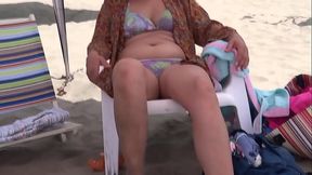 On the beach, I please my friend and let her stepson cum in my pussy.