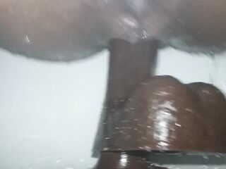 Quick shower screw...bouncing on large ebony vibrator